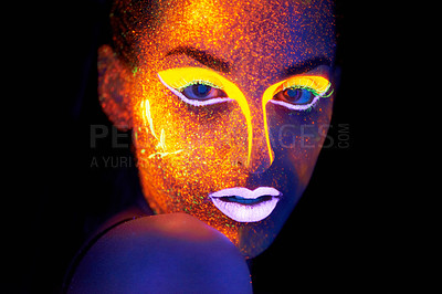 Buy stock photo Portrait, beauty and fantasy with neon woman on black background for makeup, glitter or colorful glow. Face, art and creative with confident young person in the dark for psychedelic or techno paint