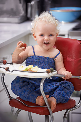 Buy stock photo Portrait, high chair and kid with apple, healthy diet and nutrition for breakfast. Hungry, baby and toddler eating fruit for growth, childhood development and happy cute child with vegan food in home