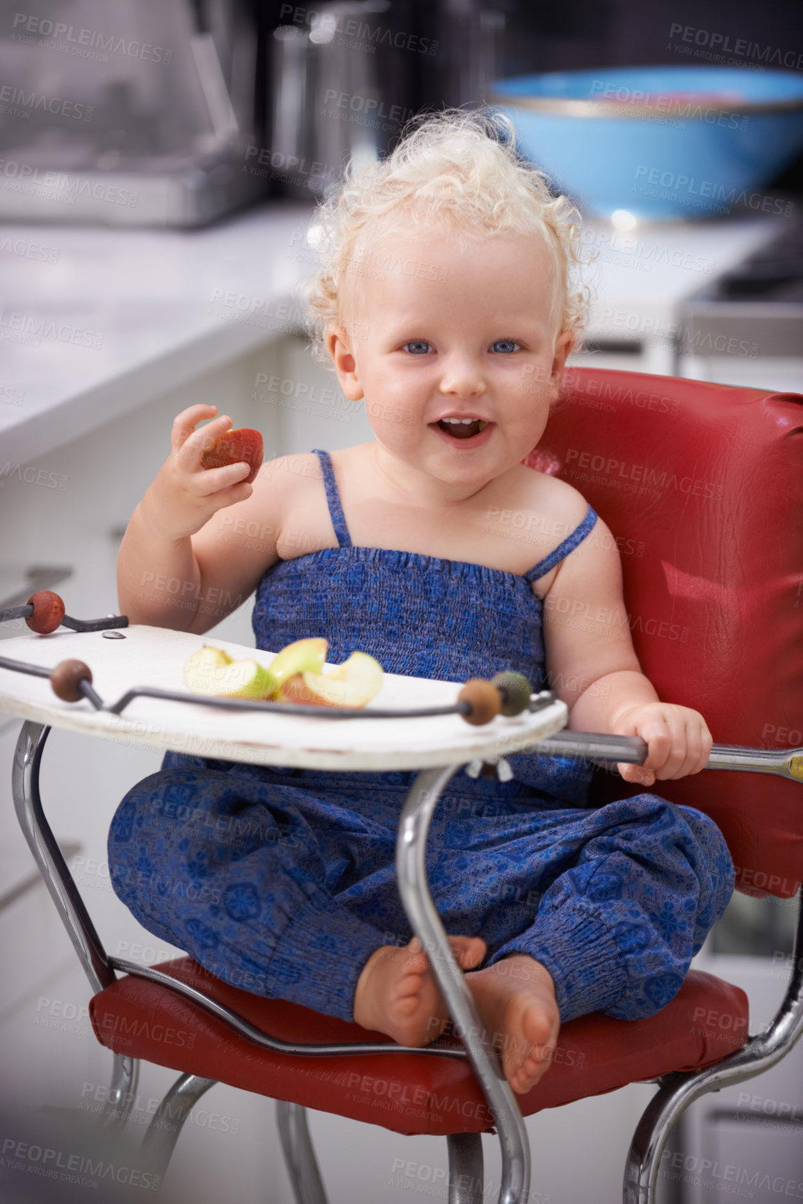 Buy stock photo Portrait, high chair and kid with apple, healthy diet and nutrition for breakfast. Hungry, baby and toddler eating fruit for growth, childhood development and happy cute child with vegan food in home