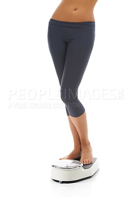 Buy stock photo Studio, legs and person with scale for weight loss progress, fitness or to track body transformation, change or slimming goals. Machine, feet and model check for BMI, diet or mass on white background