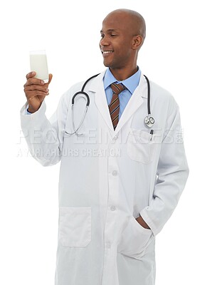 Buy stock photo Studio, doctor and happy black man with milk for liquid hydration, protein or calcium benefits for healthy bones. Glass, smoothie drink and African dietician with dairy beverage on white background