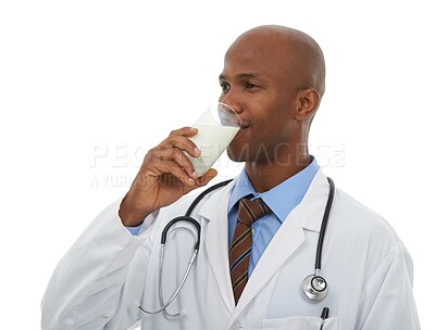 Buy stock photo Doctor, black man and drink glass of milk for liquid hydration, protein or calcium benefits for bone health. Wellness, studio or healthcare worker with dairy product for nutrients on white background