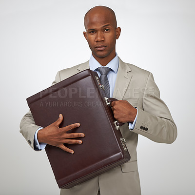 Buy stock photo Businessman, portrait and briefcase as corporate in studio for professional deal, white background or financial advisor. Black person, serious face and protect bag for company, growth or mockup space