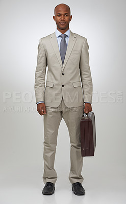 Buy stock photo Black businessman, portrait and positive by briefcase in studio, confident and law career in pride. African man, face and formal fashion for attorney and corporate professional by white background