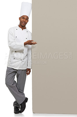 Buy stock photo Portrait, poster and black man chef with hand pointing in studio for checklist, menu or space on white background. Bakery, presentation or baker face with food tips billboard, guide or steps mock up