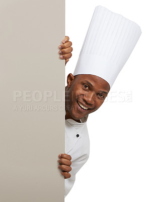 Buy stock photo Happy man, portrait and chef on poster menu in studio isolated on a white background mockup space. Face, cooking and African person on billboard for advertising, marketing sign and promotion banner