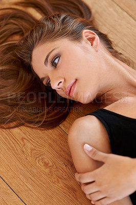 Buy stock photo Natural, makeup and woman on floor with beauty in home with calm confidence in Australia apartment. Hair care, cosmetics and above person with healthy glow from skincare lying on the ground in lounge