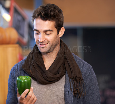 Buy stock photo Pepper, food or man shopping at a supermarket for grocery promotions, sale or discounts deal. Smile, check or customer buying groceries for healthy nutrition, organic vegetables or diet with choice