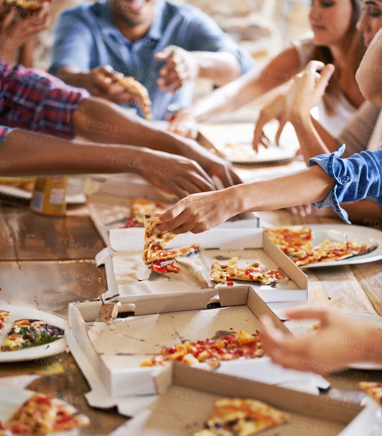 Buy stock photo Pizza party, hands and friends eating fast food, lunch and meal together in restaurant, cafe or dinner with beer, drinks and alcohol. Closeup group of people enjoy pizzas at table of social gathering