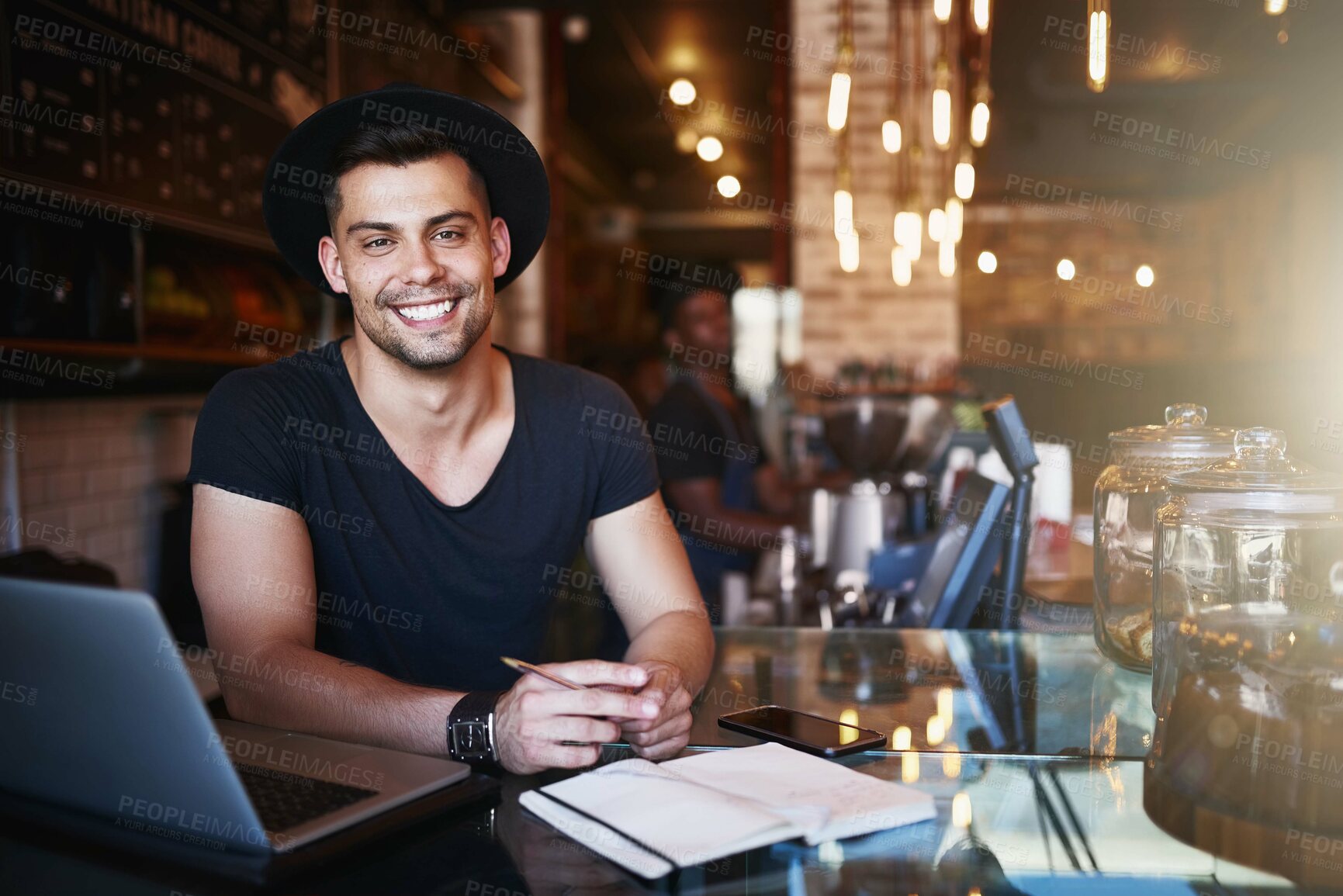 Buy stock photo Portrait, smile and man in a cafe, barista and startup success with a laptop, planning and manager. Face, male employee and entrepreneur with a notebook, coffee shop and business owner with happiness