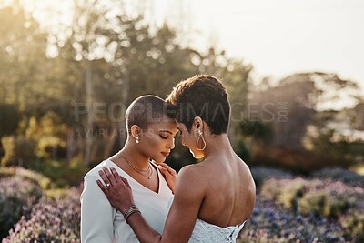 Buy stock photo Woman, lesbian couple and forehead for love, wedding or marriage commitment embracing LGBT relationship in nature. Happy gay married women vow touching heads in calm comfort for real support together