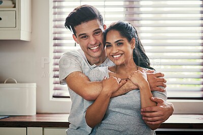 Buy stock photo Cropped shot of an affectionate couple spending quality time together at home