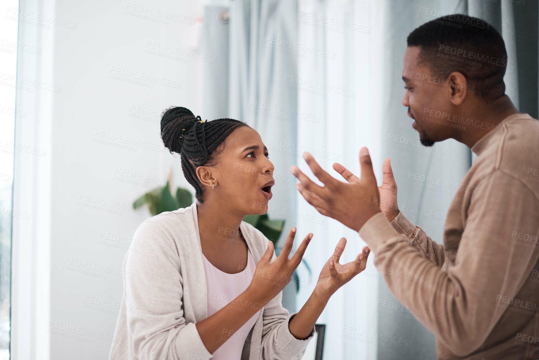 Buy stock photo Divorce, angry or black couple fight about money loan, mortgage debt or financial problems at home in Nigeria. Anger, communication and stressed black woman shouting at a frustrated African partner 