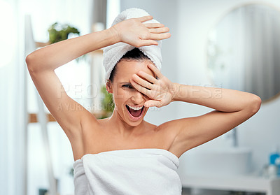 Buy stock photo Woman, portrait and happy in bathroom with towel for shower, cleaning and wellness with grooming in home. Person, face and crazy for skincare, body care and hygiene with cosmetics and healthy glow