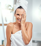 Woman, portrait and happy in bathroom with towel for shower, cleaning and wellness with grooming in home. Person, face and smile for skincare, body care and hygiene with cosmetics and healthy glow