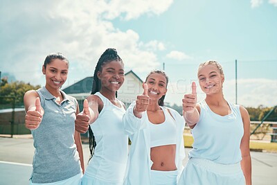 Buy stock photo Shot of a diverse group of women standing together on a tennis court and showing a thumbs up