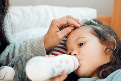 Buy stock photo Home, sick and mother with girl, bottle and relaxing with virus and illness with milk and calcium. Disease, apartment and family with mama and daughter with fever and flu with childcare and kid