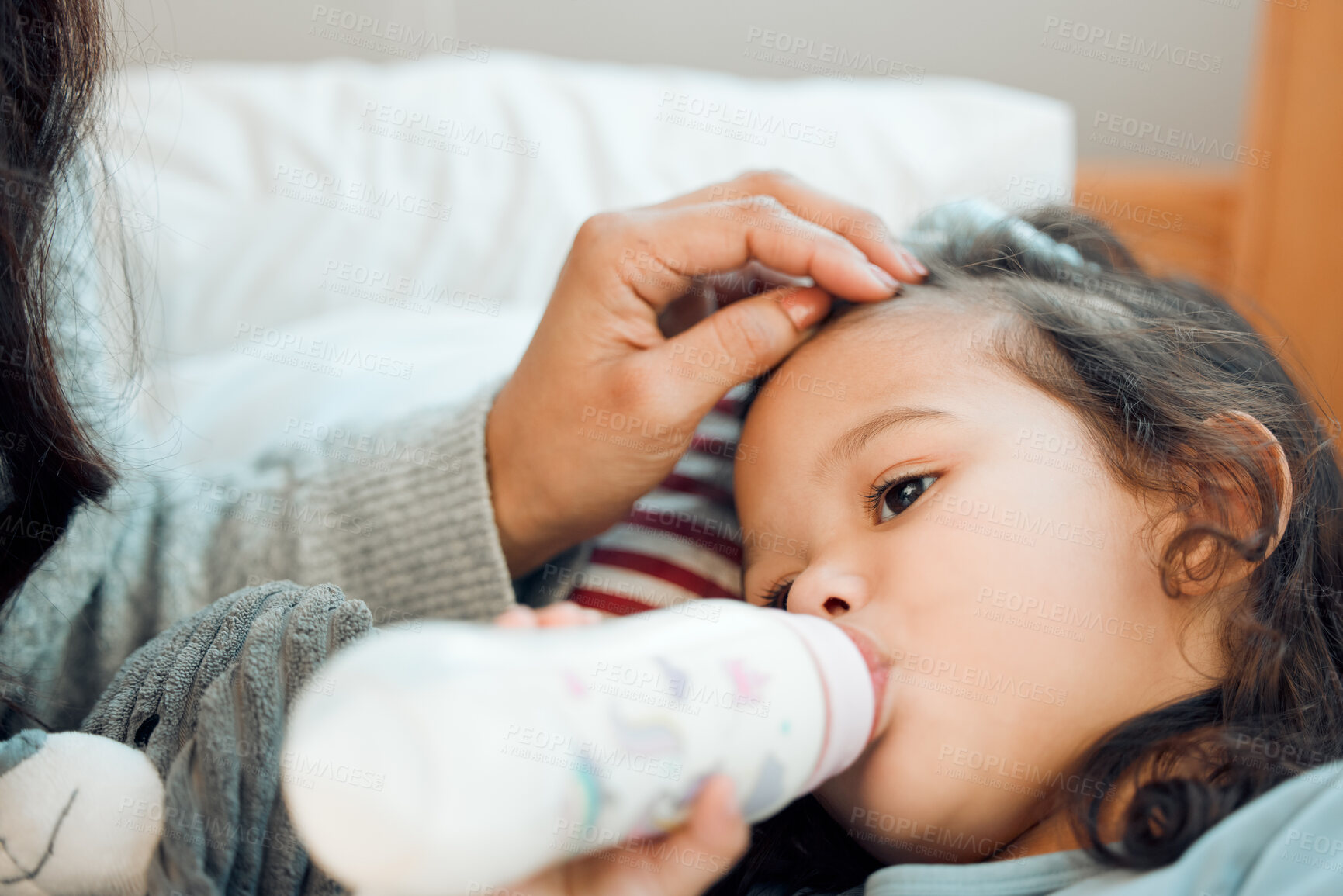 Buy stock photo Home, sick and mother with girl, bottle and relaxing with virus and illness with milk and calcium. Disease, apartment and family with mama and daughter with fever and flu with childcare and kid