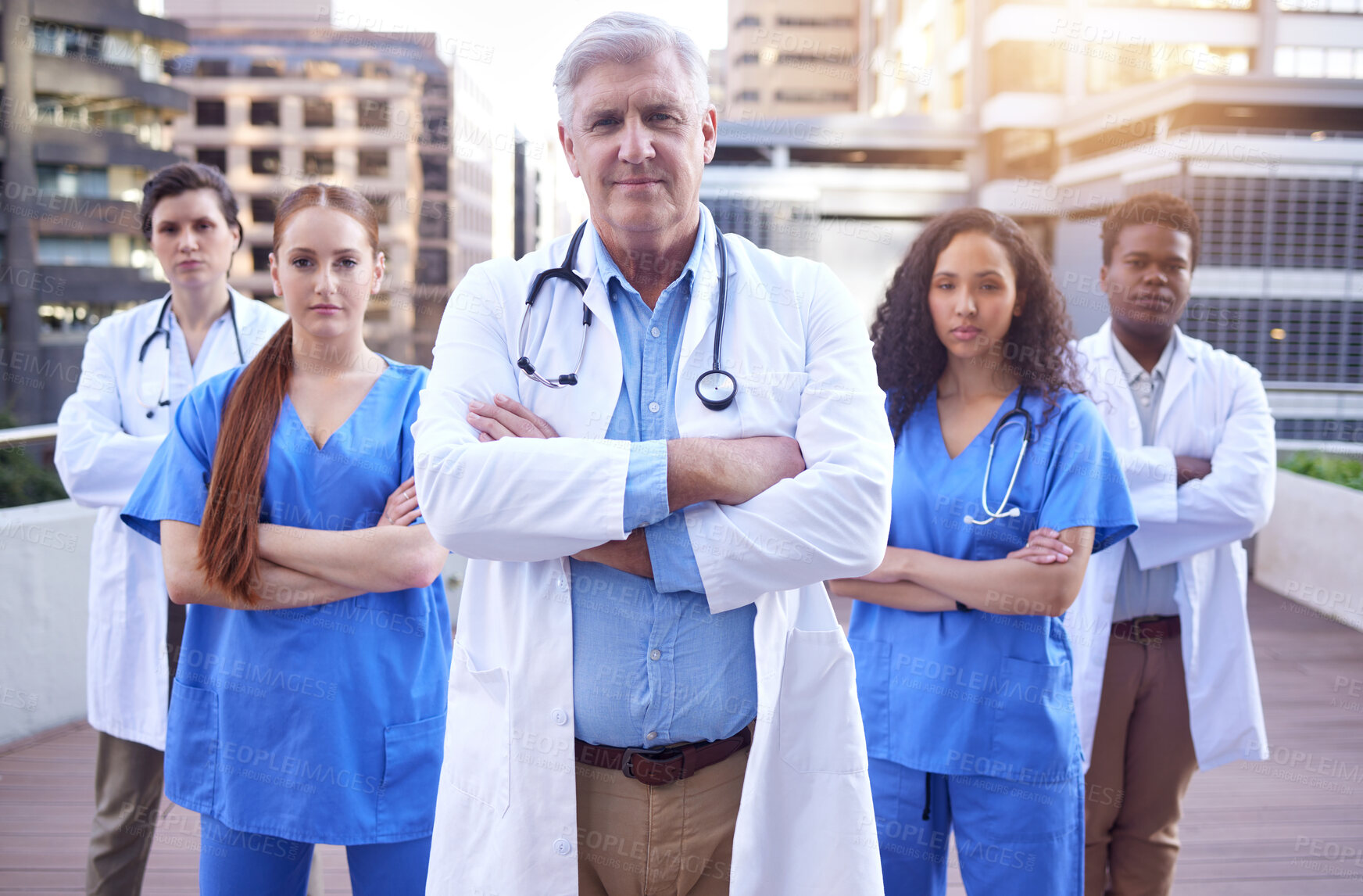 Buy stock photo Diversity, nurse and doctor arms crossed in portrait for collaboration, healthcare and service at hospital. Medical, professional and leadership with gesture for pride, teamwork and confidence