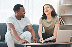 Couple, laptop and sofa with taxes, happy and paperwork with finance, planning and budget in home. Man, woman and interracial love with computer, documents and excited for financial freedom on couch