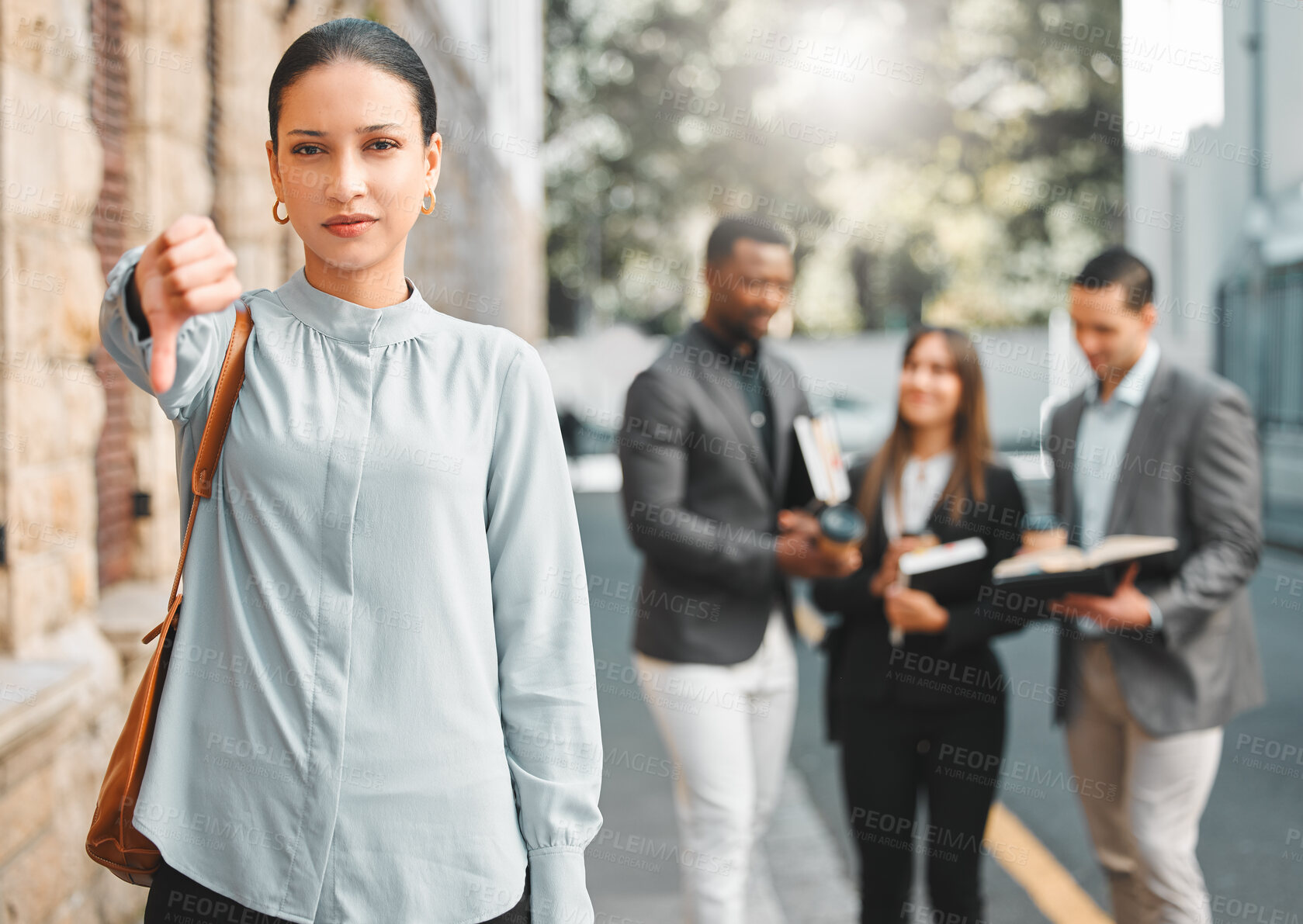 Buy stock photo Professional woman, thumbs down and outdoor with bad business review, feedback and disagreement with hand gesture. Vote, opinion and negative sign with emoji, employee portrait in city and deal fail