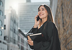 Lawyer, woman and phone call with smile in street for law, justice or human rights with advice for job at court. Attorney, advocate and person with book, contact or documentation for evidence in city