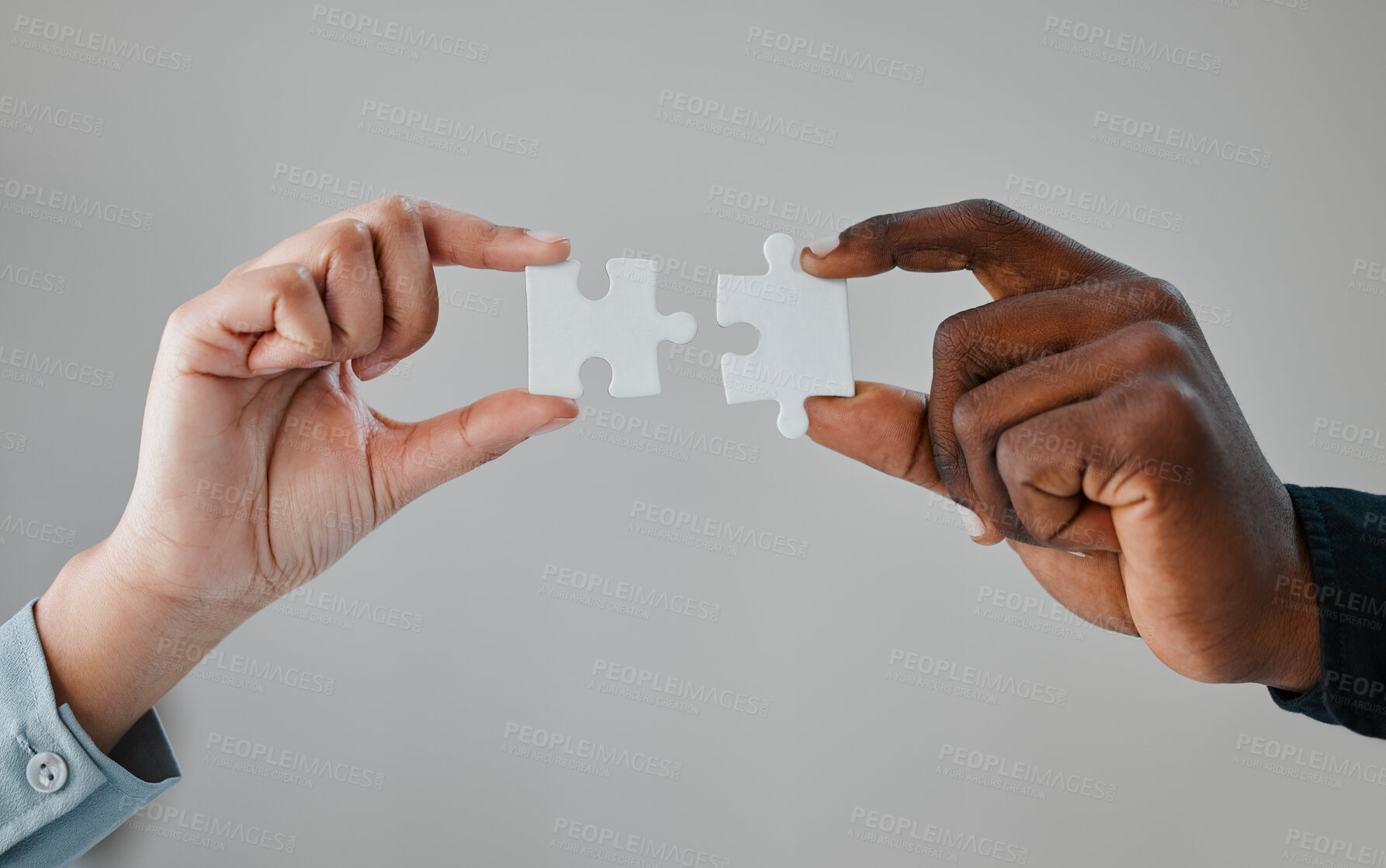 Buy stock photo People, hands and puzzle piece for teamwork for business collaboration for startup company, grey background or mockup space. Partnership, fingers and jigsaw for planning project, solution or studio