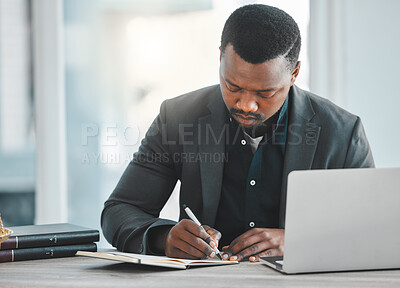 Buy stock photo Writing, planning and man or lawyer at office desk with notes for legal research, ideas or brainstorming at a law firm. Business attorney with notebook for justice, policy and human rights solution