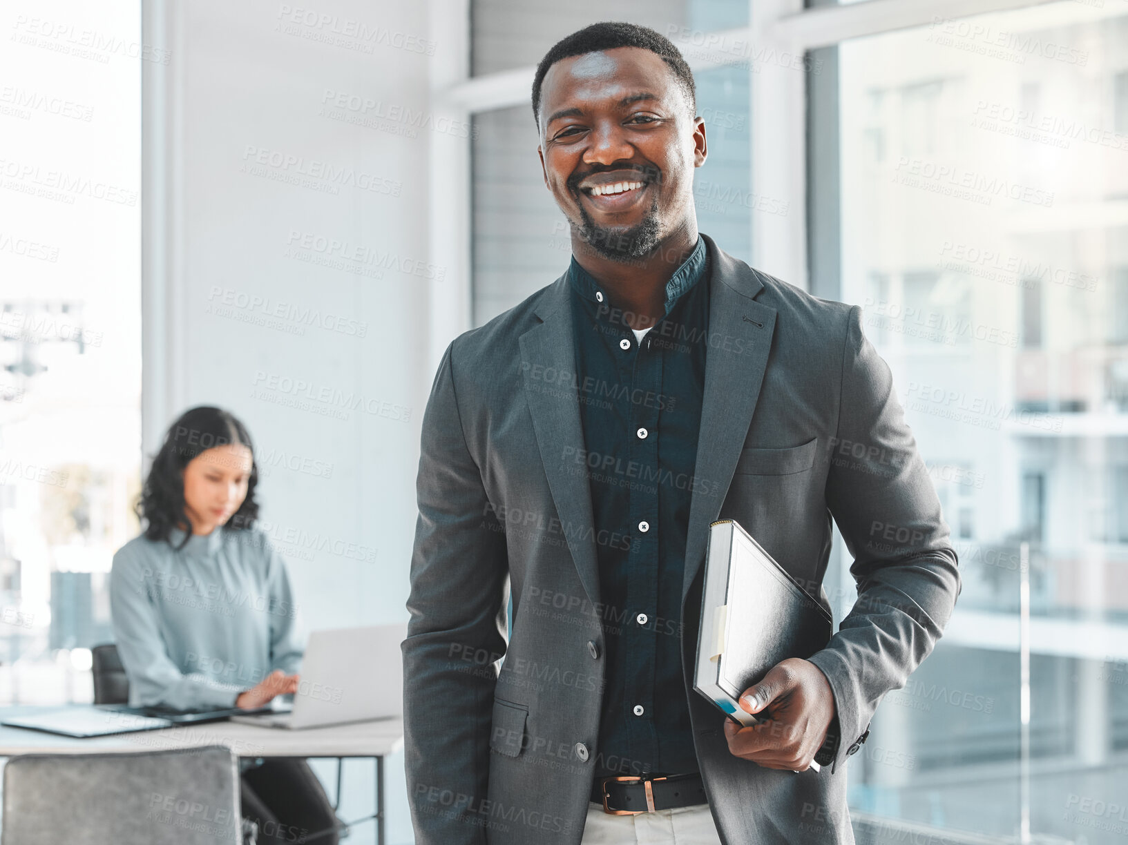 Buy stock photo Business man, portrait and happy in office for legal career, planning and confidence at a law firm. African lawyer, attorney or notary with professional style and notebook or diary for case notes