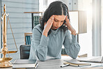 Woman, lawyer and headache from stress in office, burnout and worry for legal constitution or justice. Female person, migraine and laptop for research on court case, anxiety and advocate for solution
