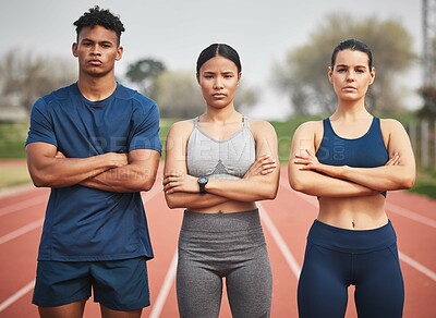 Buy stock photo Cropped portrait of three young athletes standing outside with their arms folded