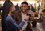 Couple, wine and cheers in nightclub with celebration for anniversary date, support or birthday event or happy. Interracial, woman and man with alcohol toast for promotion, success and smile in pub