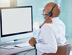 Stressed, back pain call center agent stretching bad, strained or sore muscle while working on computer. Behind of tired sales rep or support consultant working overtime or sitting long hours at desk