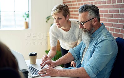 Buy stock photo business people using laptop computer working in office team leader woman sharing ideas with male colleague looking at screen