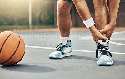 Buy stock photo Basketball, ankle in pain and injury from sports or accident on the court in a fitness game or training match outdoors. Athlete suffering with muscle inflammation, hurt leg joint or a broken bone