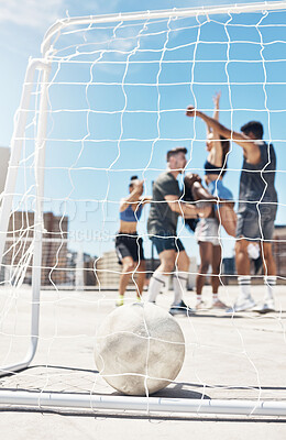 Buy stock photo Football, soccer team and ball in goal post or net with diversity sports group of men and women in celebration of win, winning and scoring on urban rooftop. Exercise, concrete training and champions