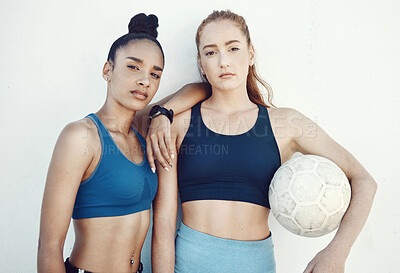 Buy stock photo Soccer, women and portrait of friends with a ball standing by a white background for training. Fitness, football and girl athletes ready for a sports workout or exercise for a game together.