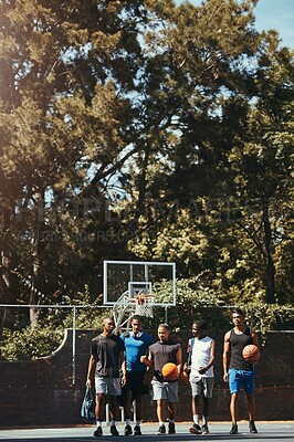 Buy stock photo Sports, friends and basketball training at basketball court with group of men walking, talking and bonding before a match. Man, team and sport practice with basketball players discussing game plan