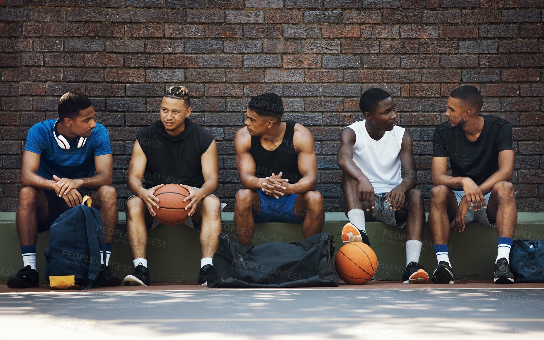 Buy stock photo Basketball, sport team and teamwork break speaking after exercise, workout and fitness. Black team training for sports collaboration and cardio rest together in a conversation about game strategy