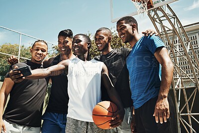 Buy stock photo Selfie, basketball and team on a sports court for partnership, collaboration and training together with a phone. Happy, young and athlete group with a photo on smartphone while doing fitness exercise
