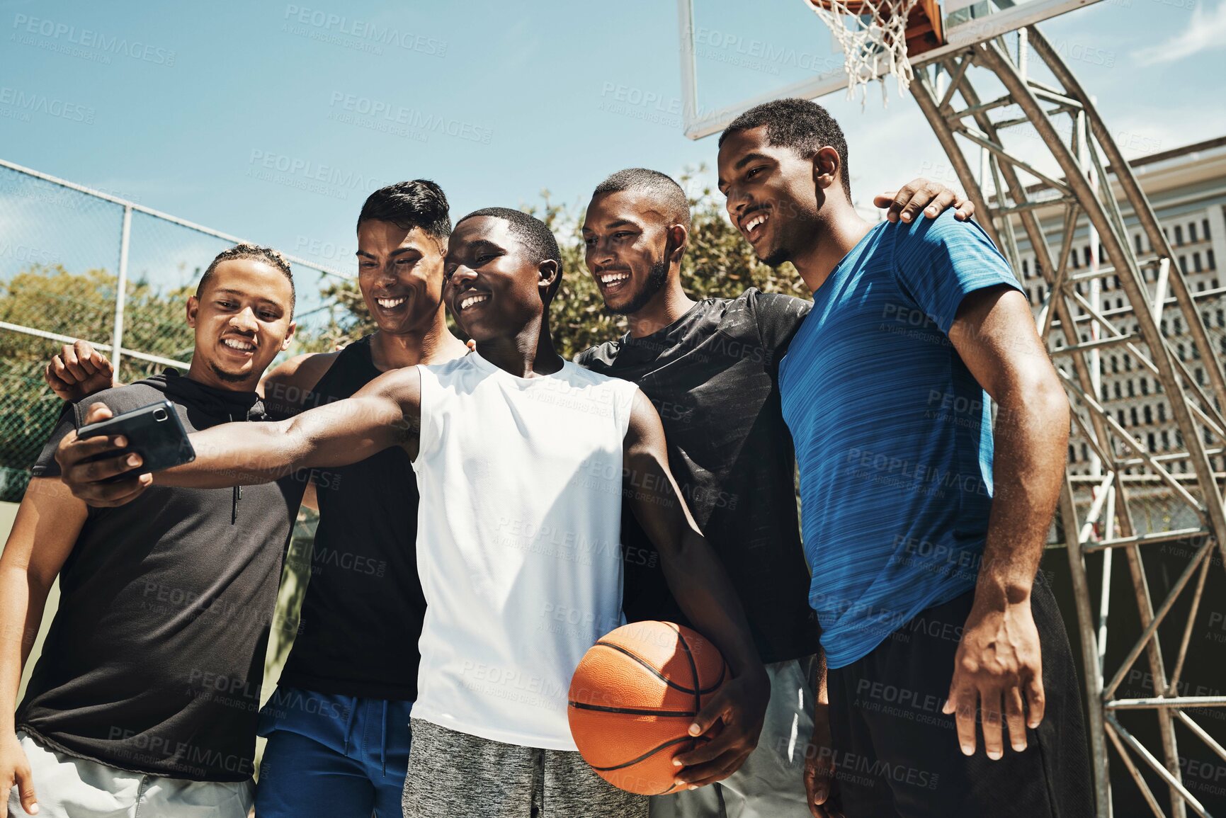 Buy stock photo Selfie, basketball and team on a sports court for partnership, collaboration and training together with a phone. Happy, young and athlete group with a photo on smartphone while doing fitness exercise