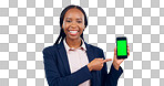 Business woman, smartphone and pointing to green screen for advertising space, offer and mockup newsletter in studio. Portrait, happy african worker and mobile announcement of deal on grey background