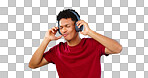 Man, headphones and dancing with music in studio for mock up of streaming service on blue background. Cape Town, male model and eyes closed for listening to song, podcast or radio in space with promo
