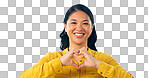 Portrait, smile and heart hands with a young asian woman isolate