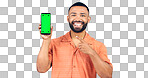 Man, portrait and pointing to green screen of phone for advertising space, sign up offer or mockup newsletter in studio. Smartphone, announcement or digital marketing of promotion on white background