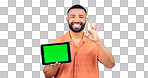Portrait, man and ok for tablet with green screen, space or advertising agreement in studio on white background. Happy model, digital marketing and yes emoji for promotion, sign up deal or newsletter
