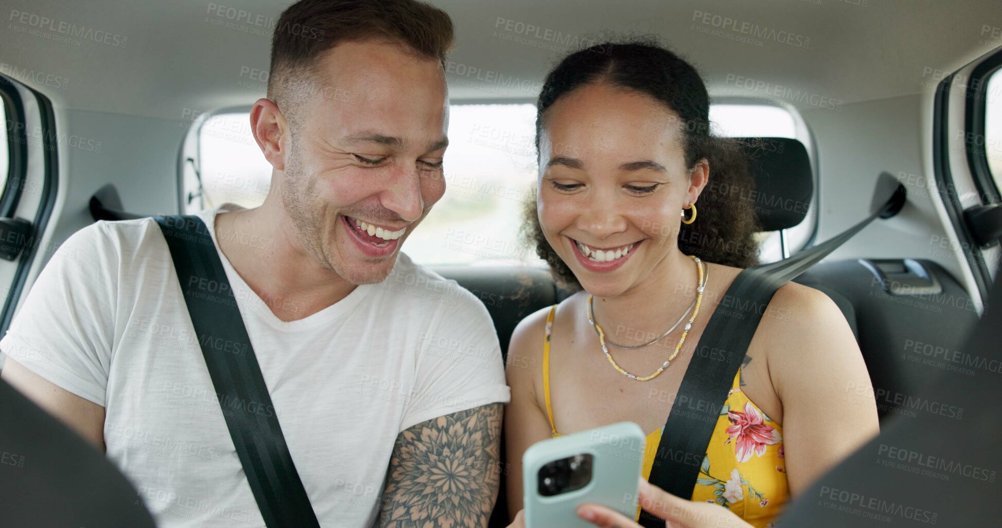 Buy stock photo Couple of friends, phone and car for road trip information, location search and social media. Happy man and woman on mobile app talking of travel, holiday and transportation service with funny chat