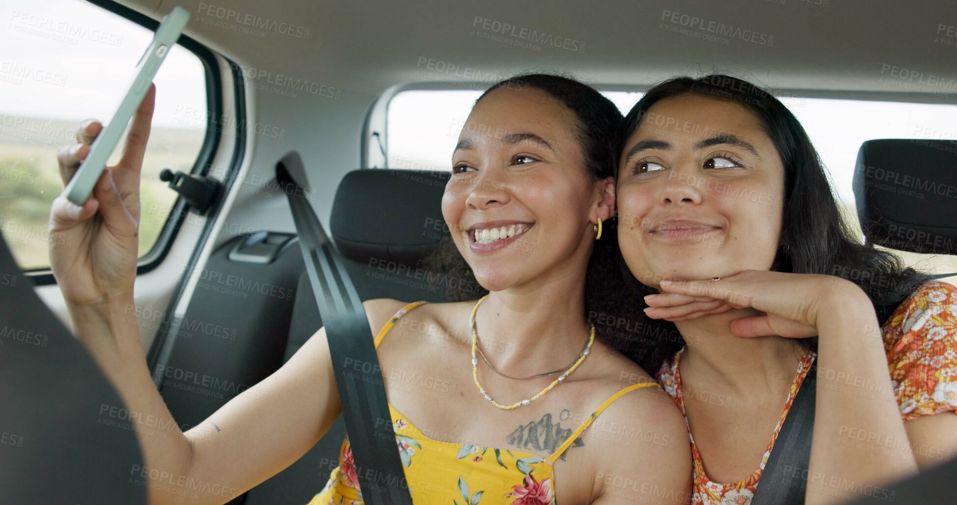 Buy stock photo Woman, friends and selfie on road trip with smile, tongue and funny face with adventure in car. Girl, photography and kiss with care, journey or holiday with memory, profile picture or transportation