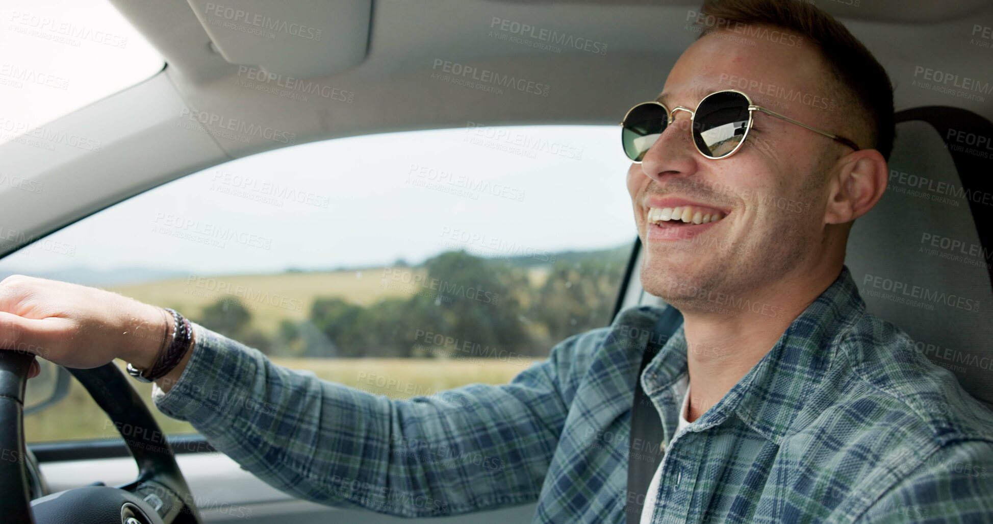Buy stock photo Happy man, car and driving for road trip, travel or outdoor adventure in the countryside. Young male person or driver smile in vehicle for transportation, journey or vacation on street or asphalt