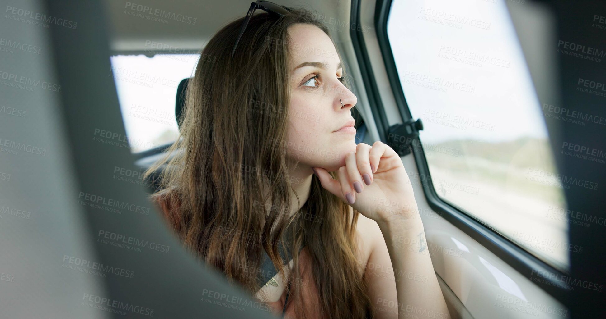 Buy stock photo Thinking, driving and young woman in a car on a road trip for adventure, journey or vacation. Idea, reflection and female person from Australia with memory by window in vehicle for holiday transport.